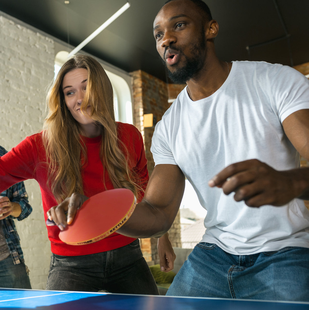 Lifestyle image of GTX 85 table tennis racket being used in game play 
