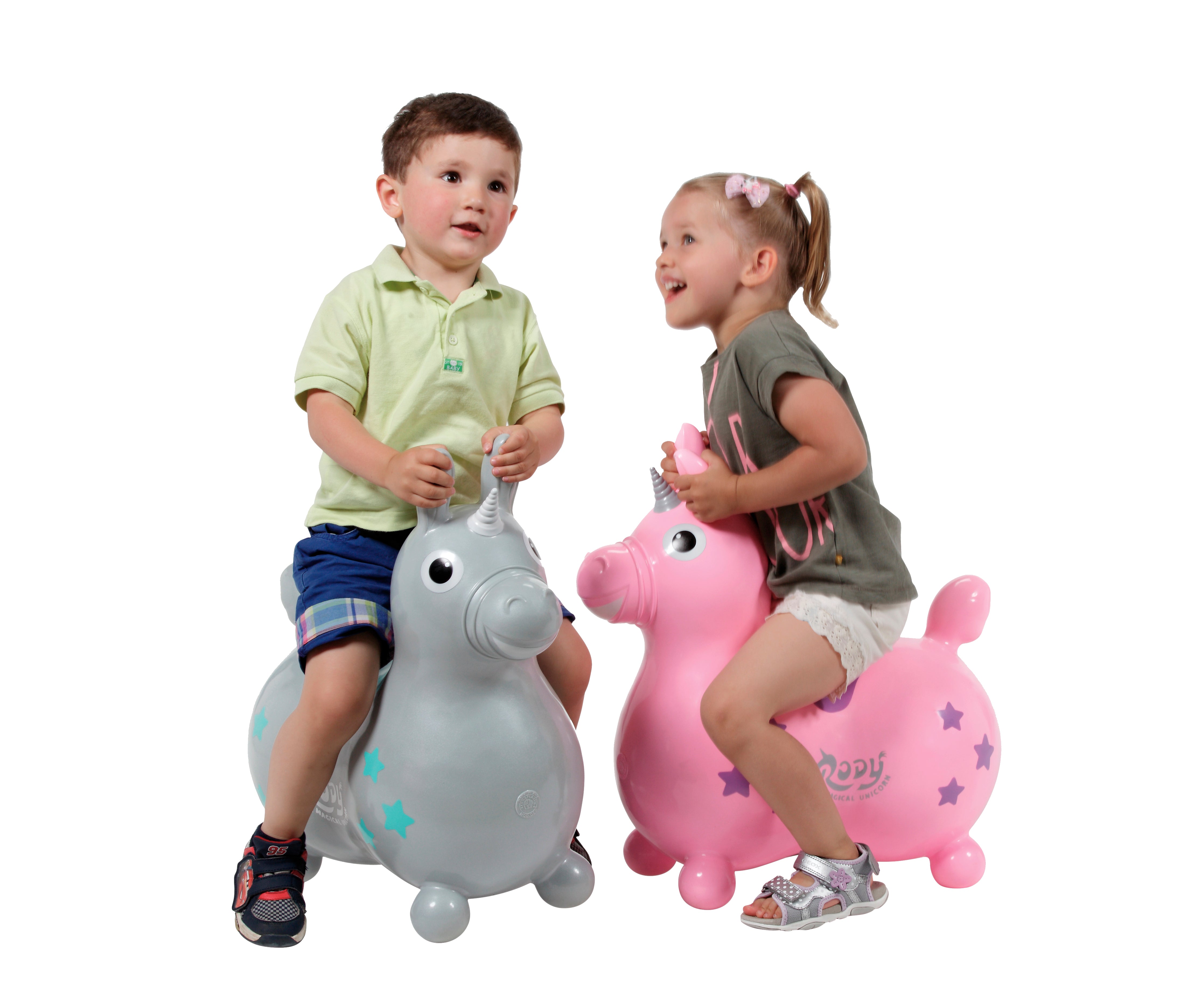 Studio image of the gray and pink Rody Magical Unicorns with  children sitting on them.
