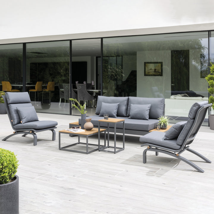 Soho Loveseat Bench With Side Tables in outdoor patio setting with gray cushions and teak accents.