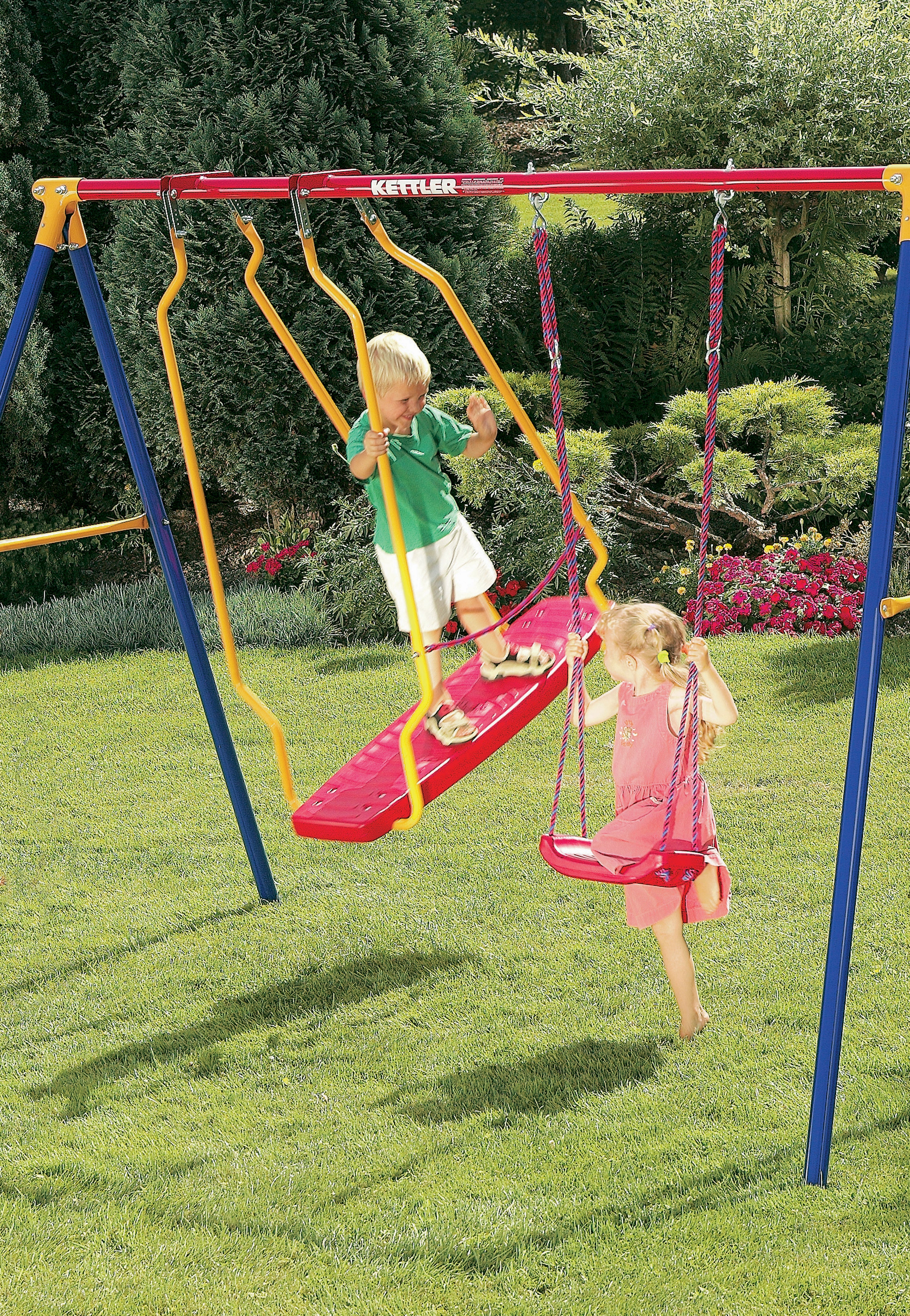 Childen playing on the KETTLER Multi-Play Swingset Bundle