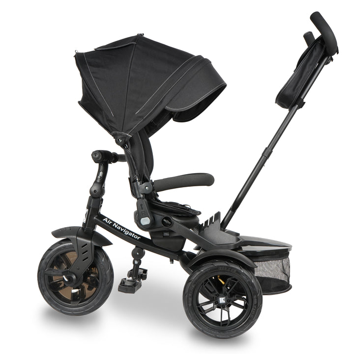 KETTLER Air Navigator 6-in-1 Tricycle in black with adjustable handle, canopy, and storage basket for ages 10-72 months.